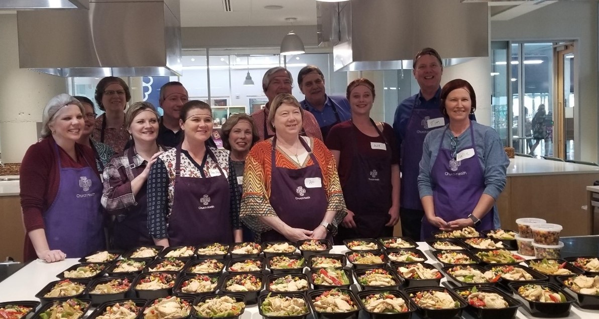 Church Health Center: Preparing Meals for those in Need